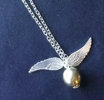 Buy Harry Potter Antique Golden Snitch Necklace Quidditch Angel Wings Film Prop.  • 3.45£